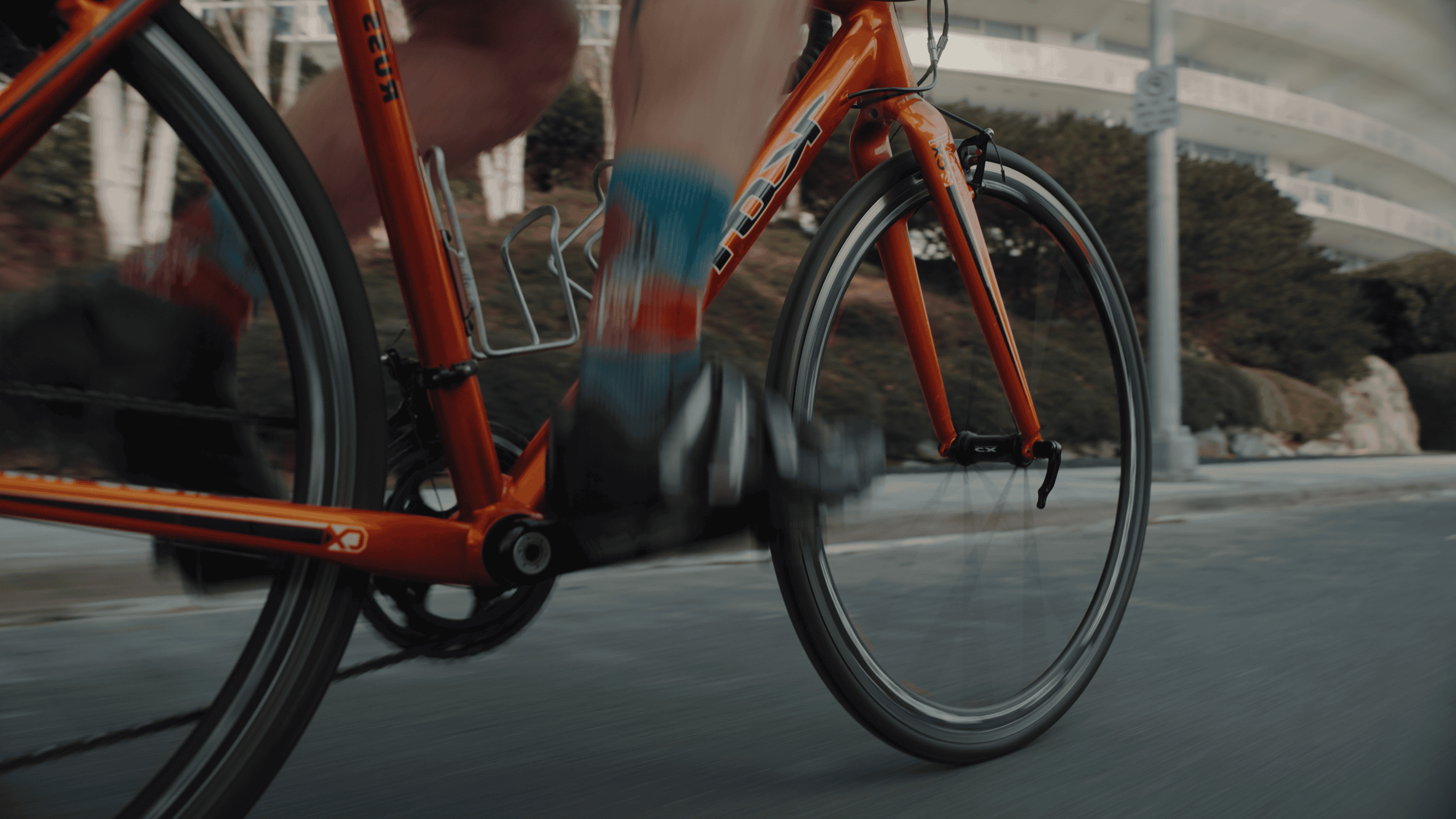 Cyclist receiving physiotherapy treatment for bike-related injuries or recovery.