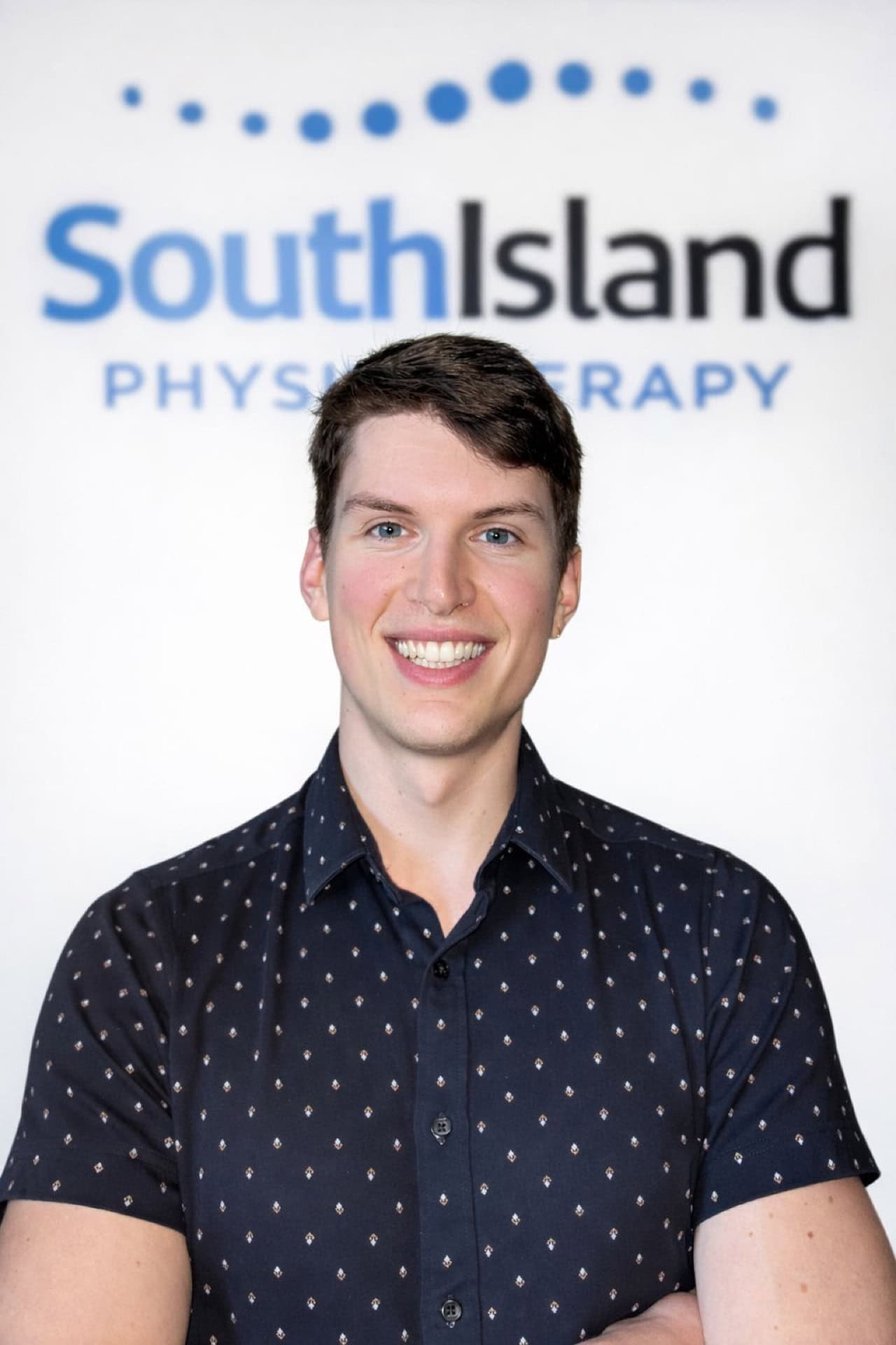 Brady Alexov at South Island Physiotherapy clinic, providing expert physiotherapy services in a welc.